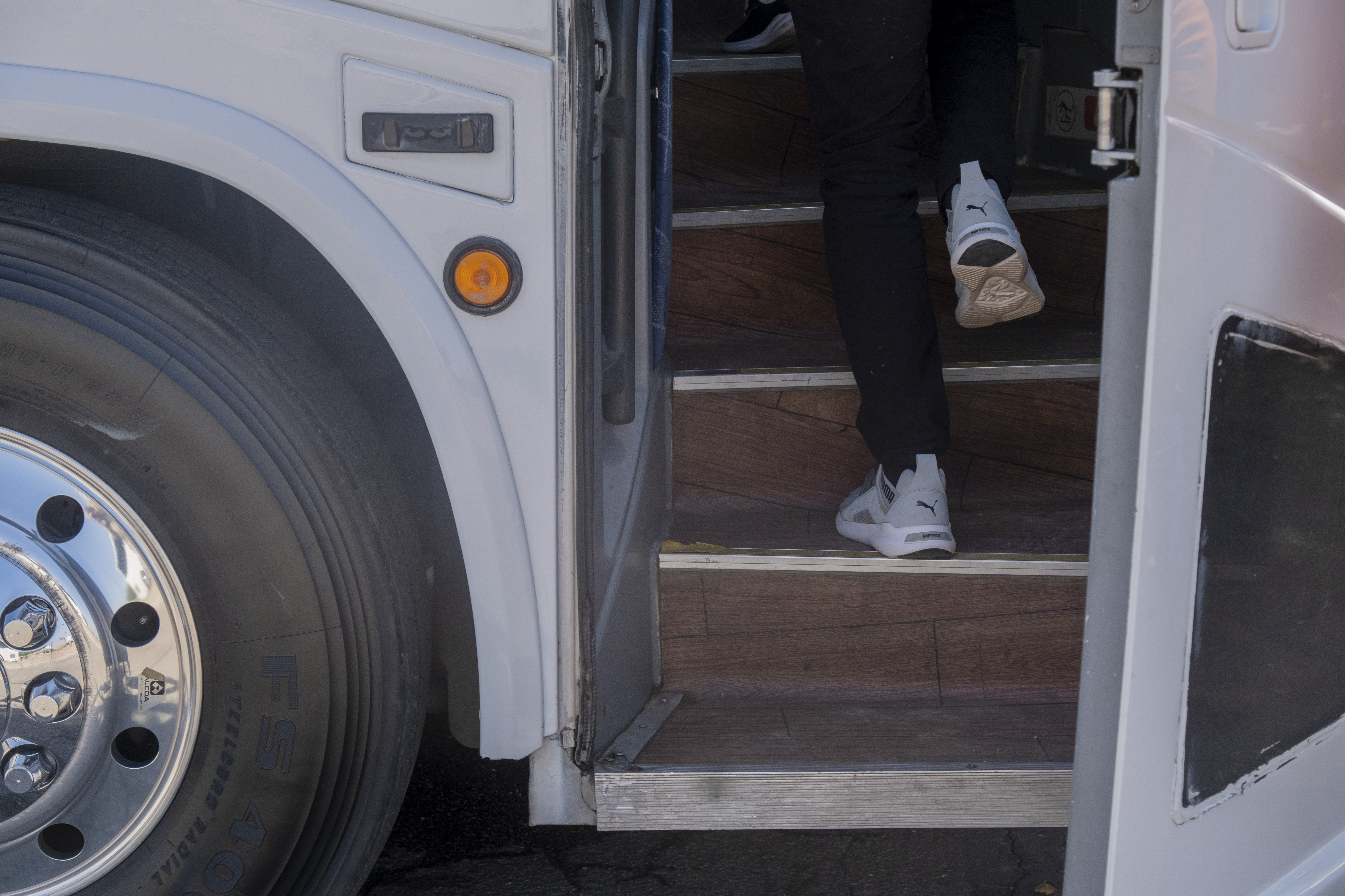 Migrant boards bus